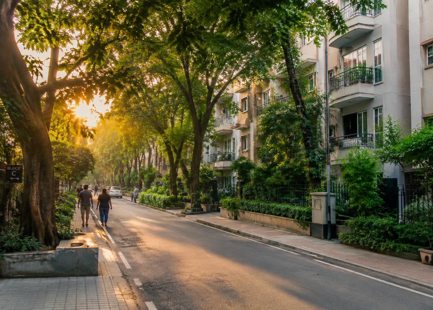 Green residential neighbourhood street in New Delhi, NCR at golden hour